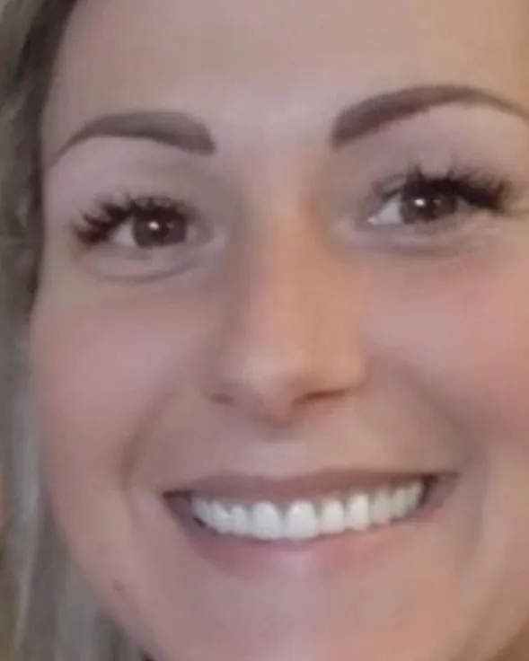 Tiffany smiling with her new dentures